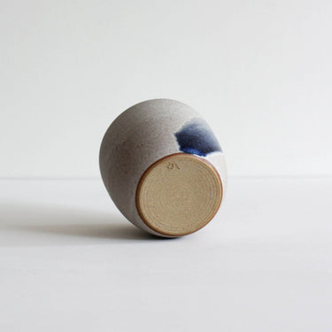 Ceramic flat white cup with blue brushstroke