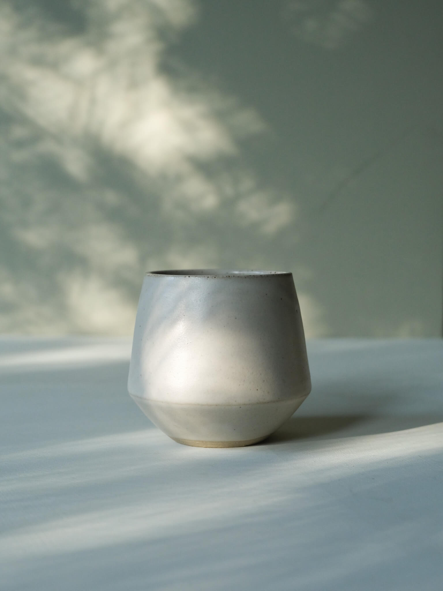 Flat white cup handmade by Clare Spindler