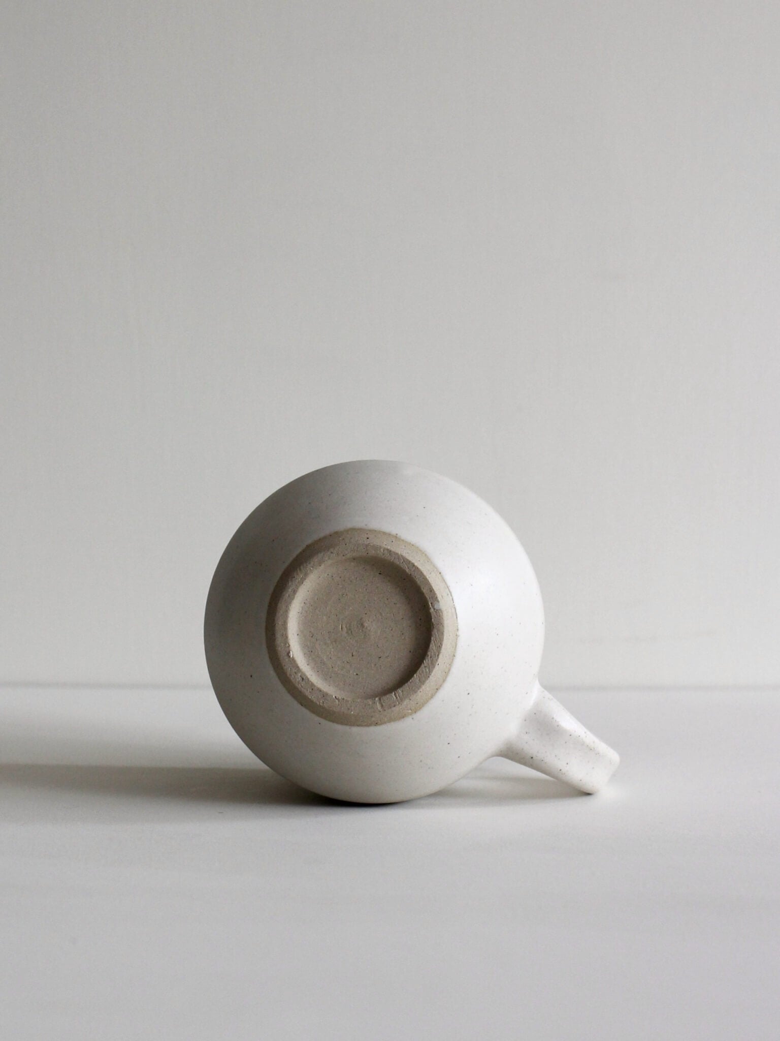 Large white ceramic mug by Clare Spindler