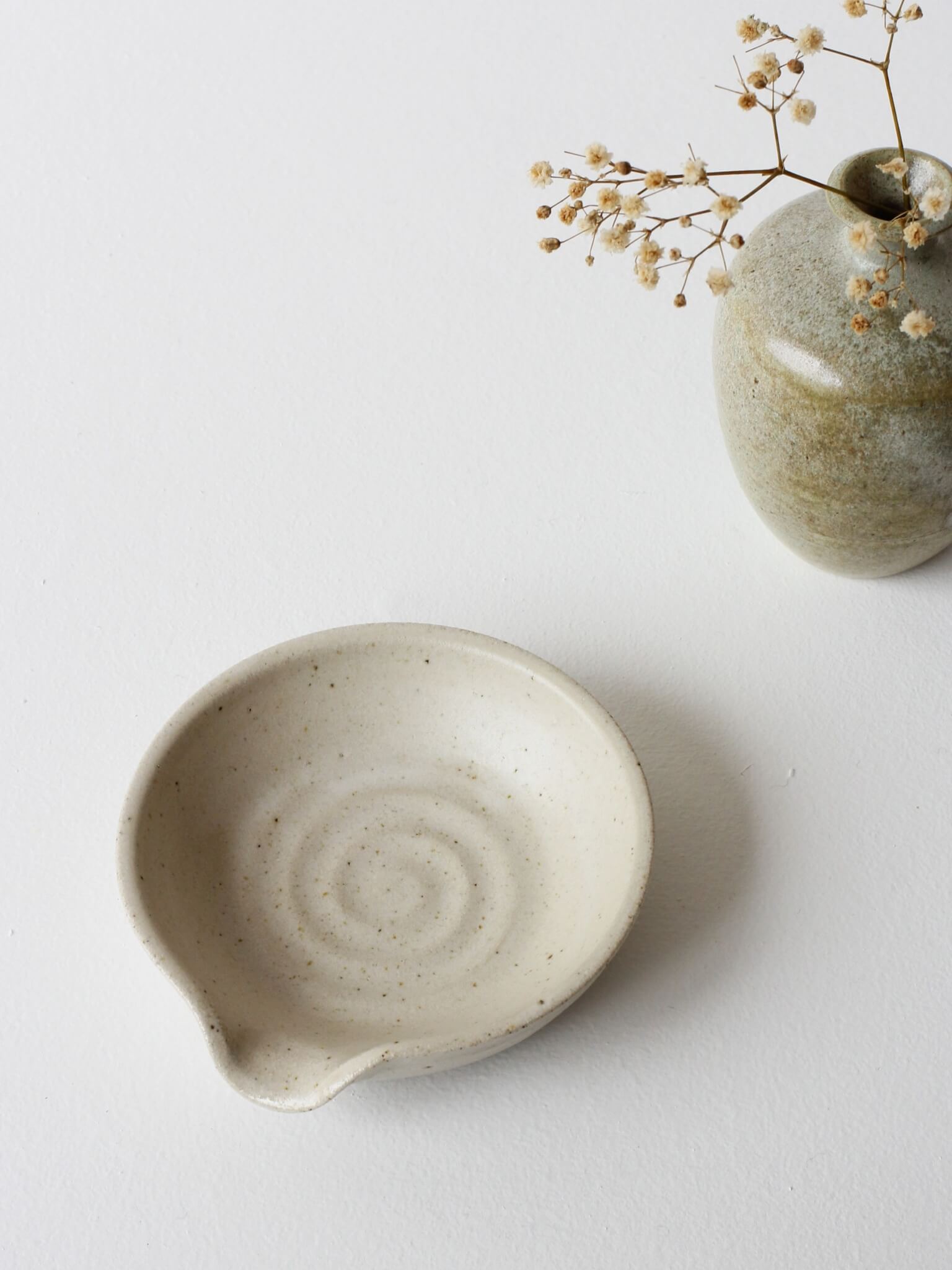 Swirl Spoon Rest made by Florence Ceramics