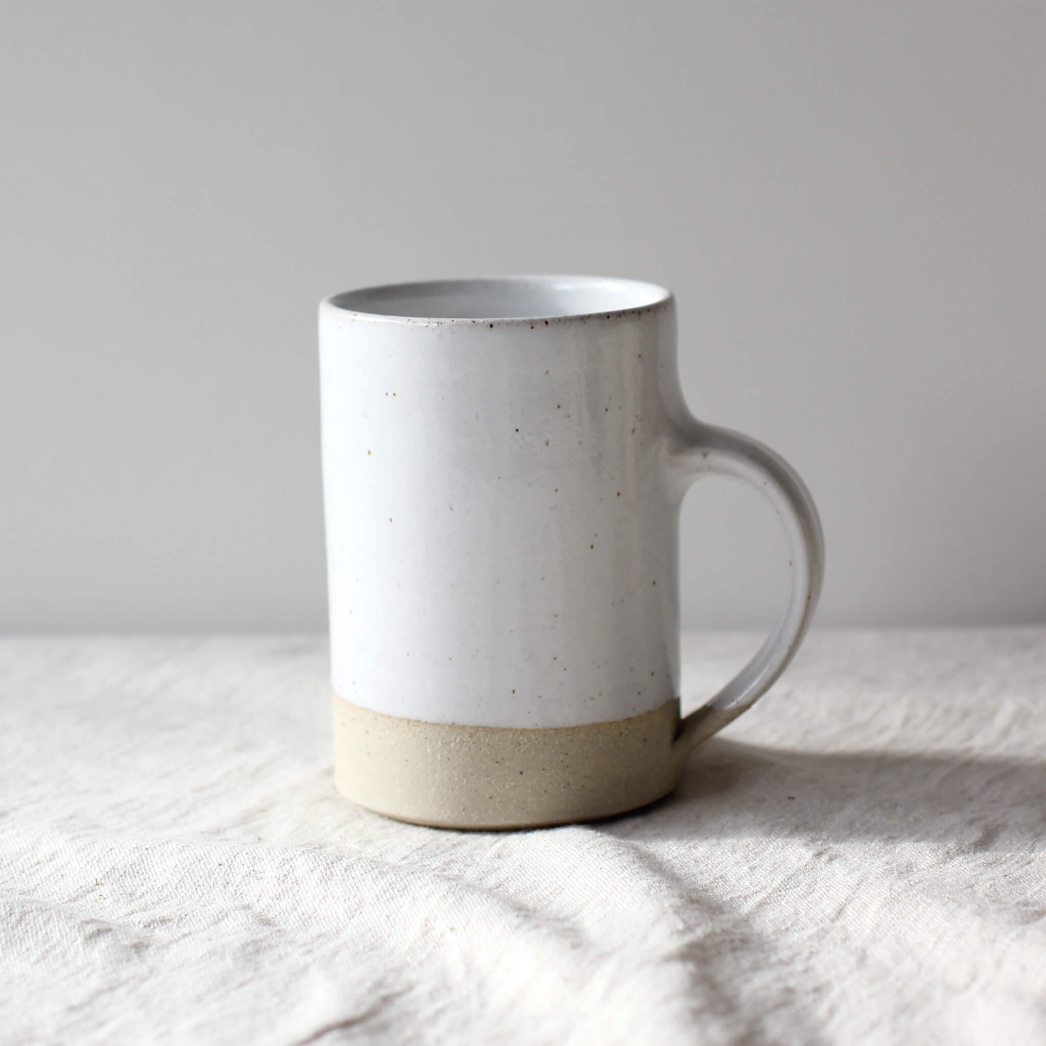 POTTERY WEST Speckled White Tall Mug