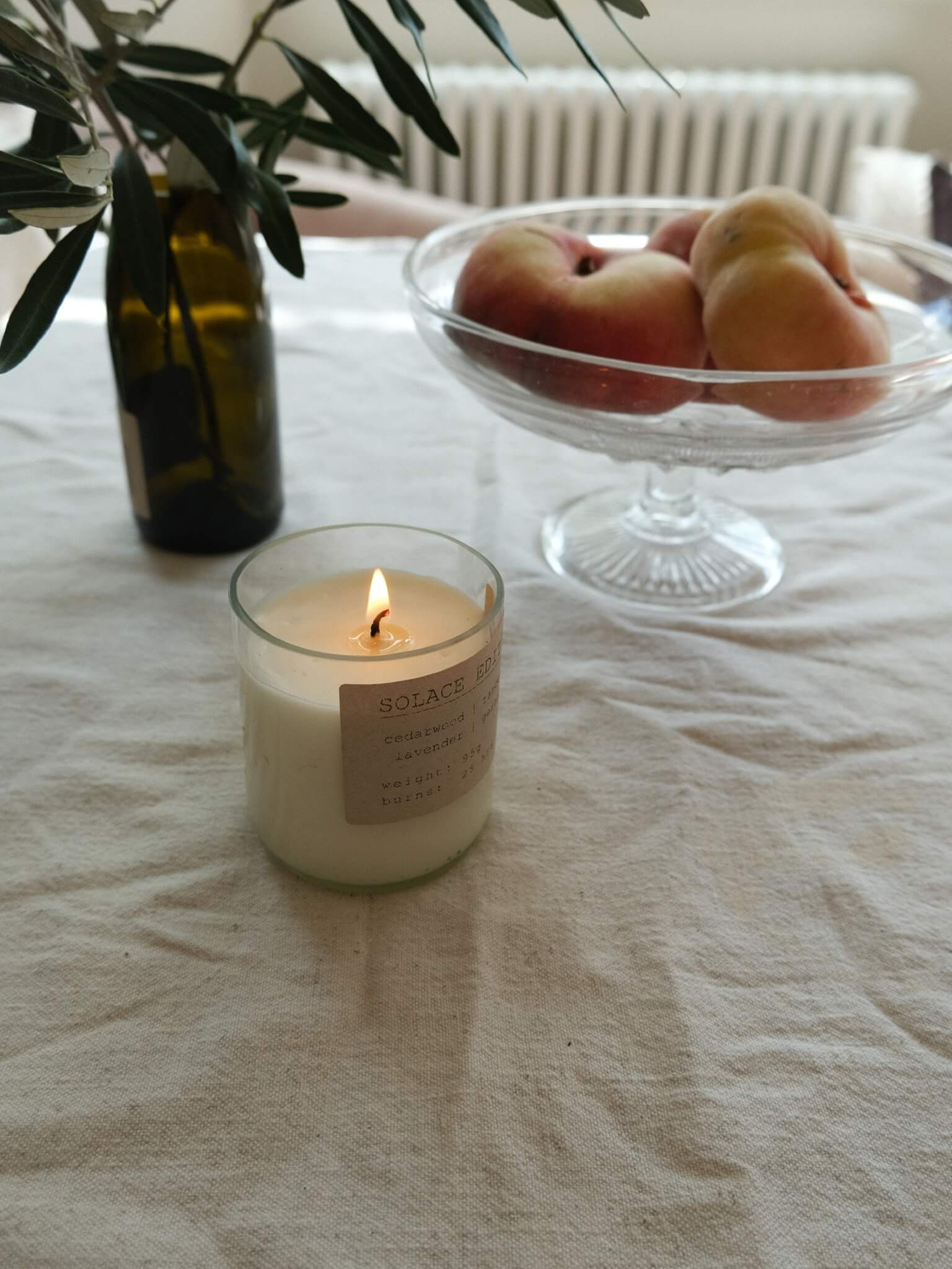 Calming essential oil candle in a recycled glass jar
