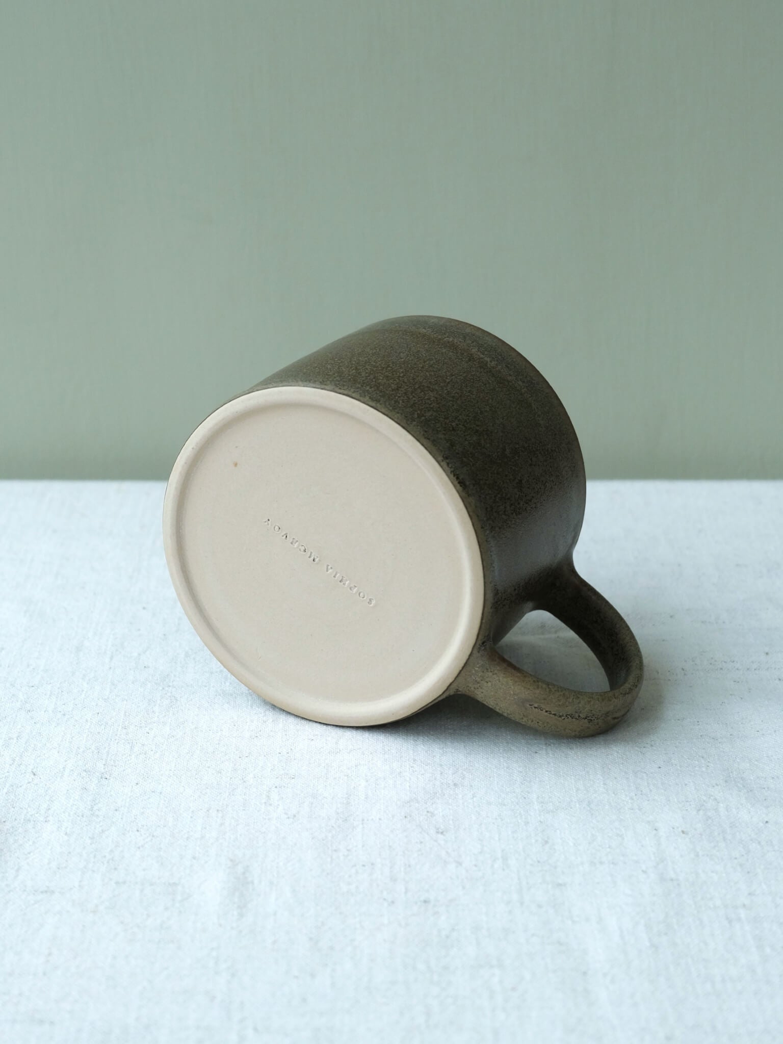 Wide ceramic mug made by Sophia McEvoy