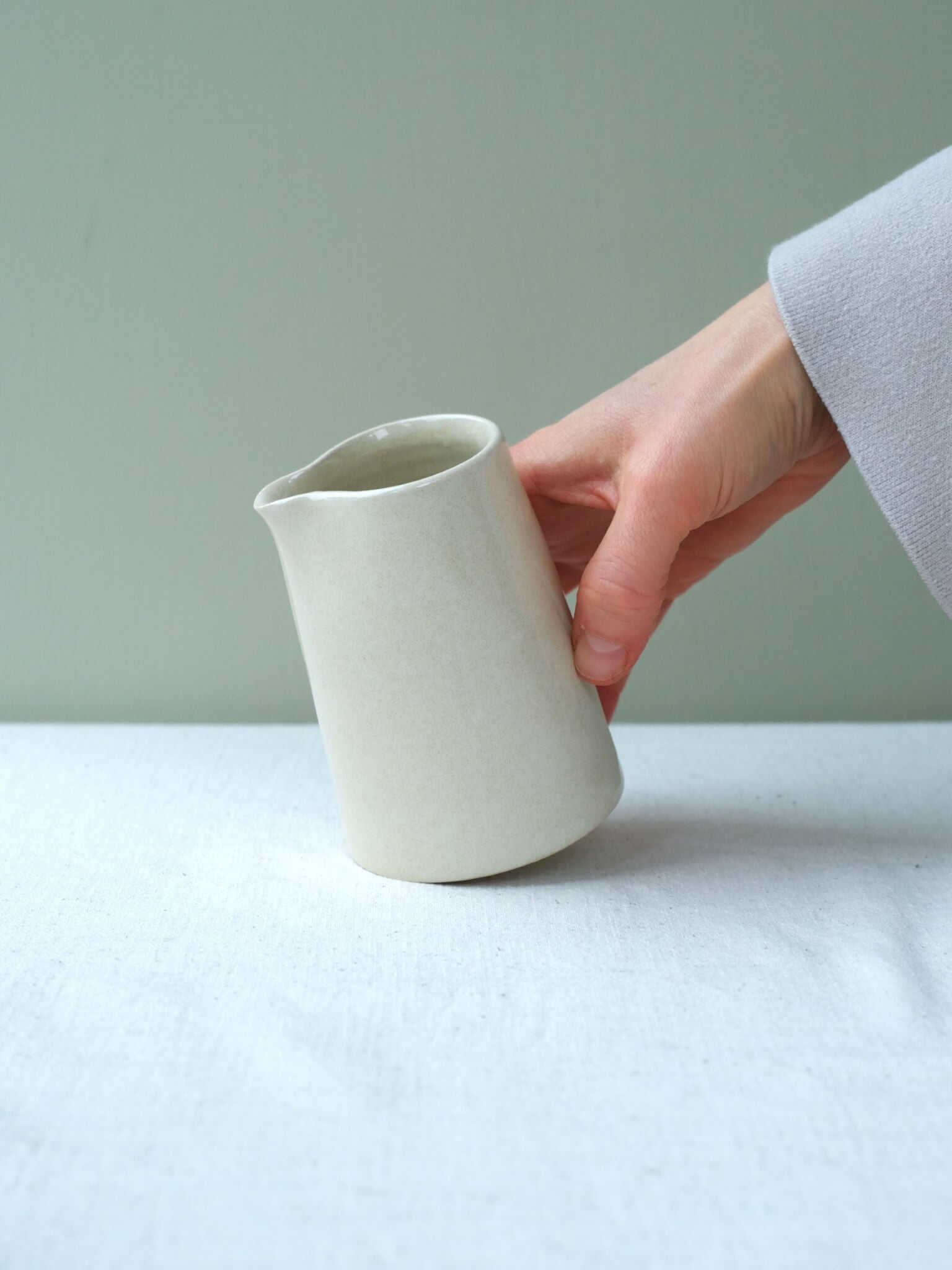 Ceramic milk jug with buttermilk glaze, made by Sophia McEvoy